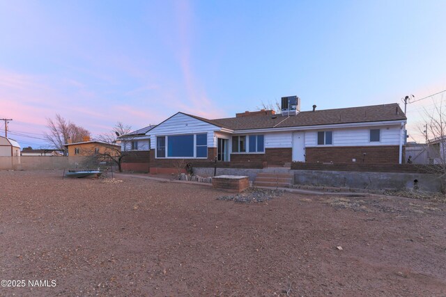 view of front of home with cooling unit