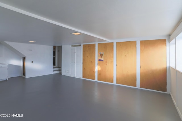 interior space featuring concrete flooring