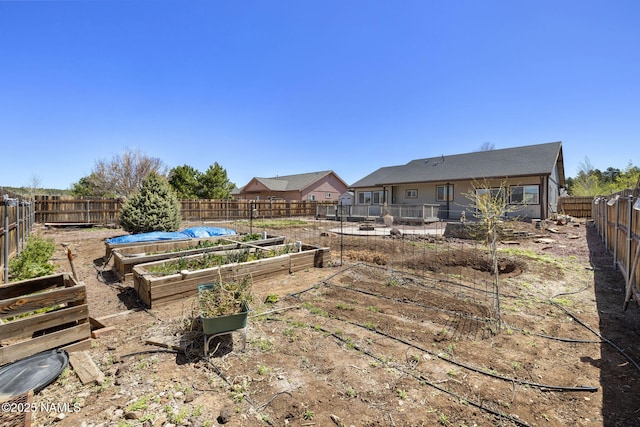 905 Hereford Dr, Williams, AZ 86046 - fenced backyard featuring a vegetable garden