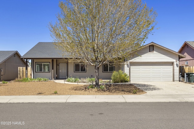 905 Hereford Dr, Williams, AZ 86046 - view of front facade featuring an attached garage and driveway