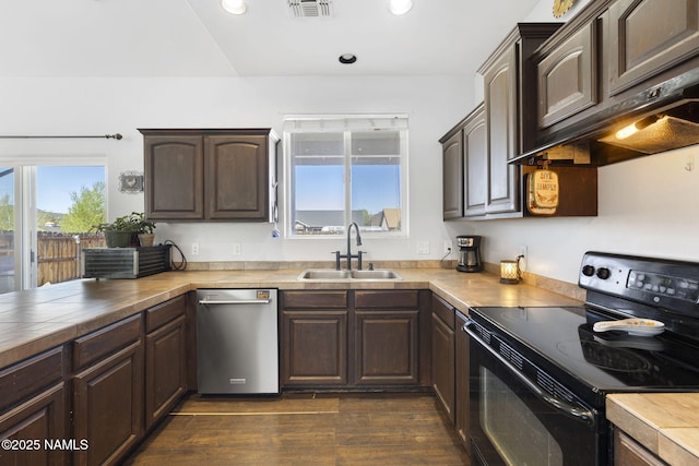 905 Hereford Dr, Williams, AZ 86046 - kitchen featuring black / electric stove, a sink, dishwasher, dark brown cabinets, and dark wood finished floors