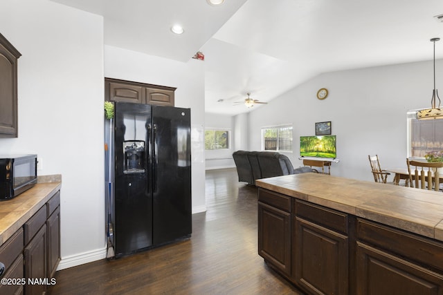 905 Hereford Dr, Williams, AZ 86046 - kitchen with black appliances, dark brown cabinetry, vaulted ceiling, ceiling fan, and dark wood finished floors
