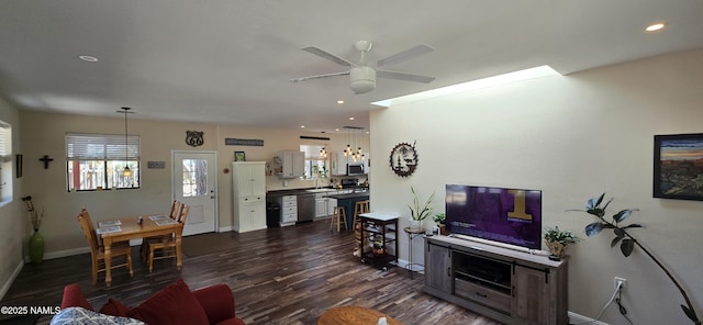 1111 W Sheridan Ave, Williams, AZ 86046 - living area with a ceiling fan, dark wood-type flooring, baseboards, and recessed lighting