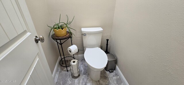 1111 W Sheridan Ave, Williams, AZ 86046 - bathroom with toilet, baseboards, and tile patterned flooring