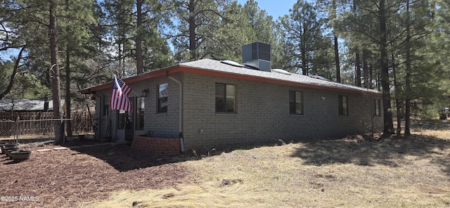 1111 W Sheridan Ave, Williams, AZ 86046 - view of home's exterior featuring a chimney