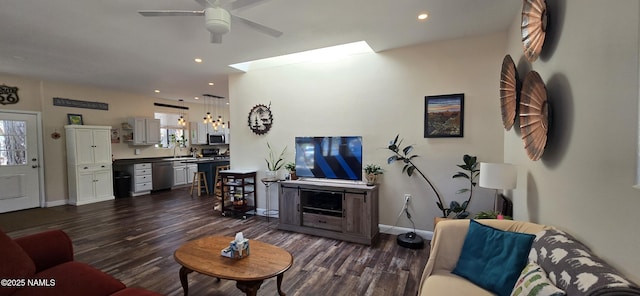 1111 W Sheridan Ave, Williams, AZ 86046 - living room with a ceiling fan, dark wood-style flooring, baseboards, and recessed lighting