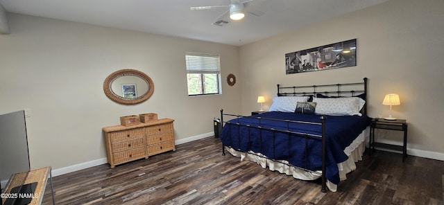 1111 W Sheridan Ave, Williams, AZ 86046 - bedroom with wood finished floors, baseboards, and a ceiling fan