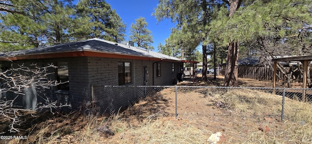 1111 W Sheridan Ave, Williams, AZ 86046 - view of side of home featuring concrete block siding