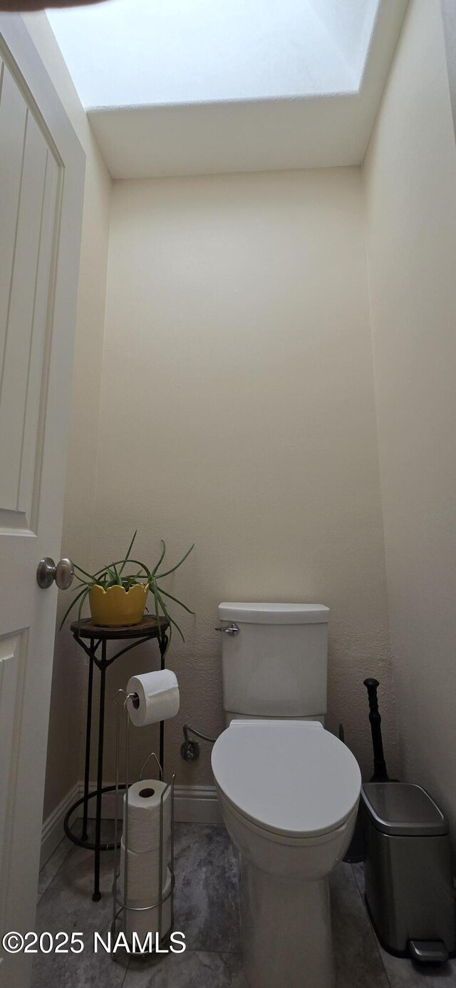 1111 W Sheridan Ave, Williams, AZ 86046 - bathroom with toilet and baseboards