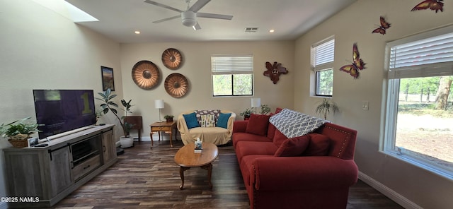 1111 W Sheridan Ave, Williams, AZ 86046 - living room with dark wood finished floors, ceiling fan, baseboards, recessed lighting, and a skylight