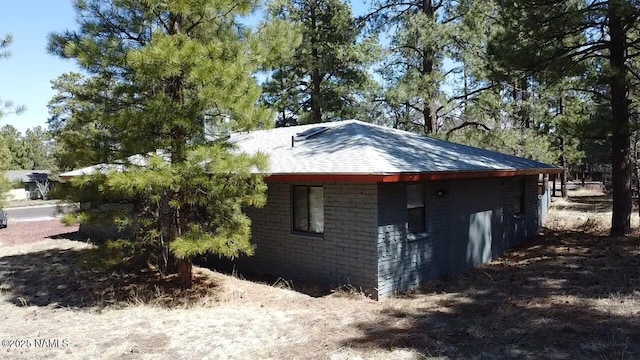 1111 W Sheridan Ave, Williams, AZ 86046 - view of property exterior with roof with shingles