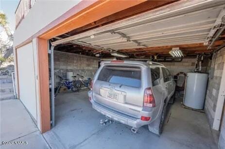 garage featuring water heater