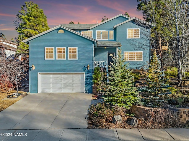 view of front property with a garage