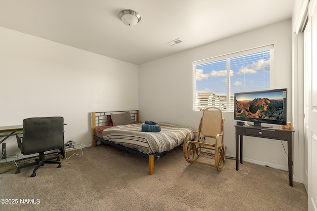 12361 Pegasus Rd, Bellemont, AZ 86015 - bedroom with light colored carpet and baseboards