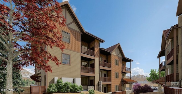 view of building exterior with a mountain view