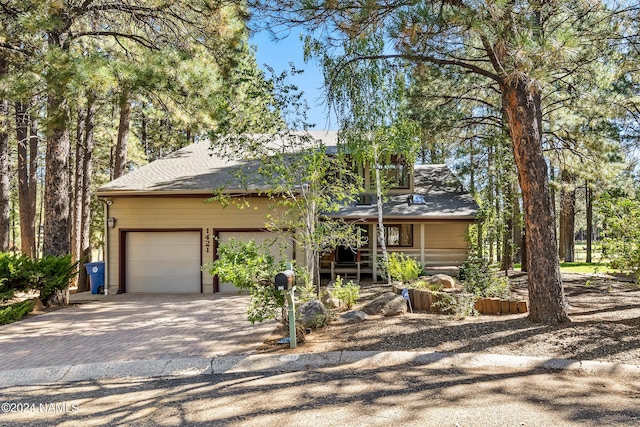 view of front of property featuring a garage