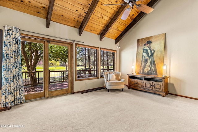 living area featuring beamed ceiling, wooden ceiling, carpet, high vaulted ceiling, and ceiling fan