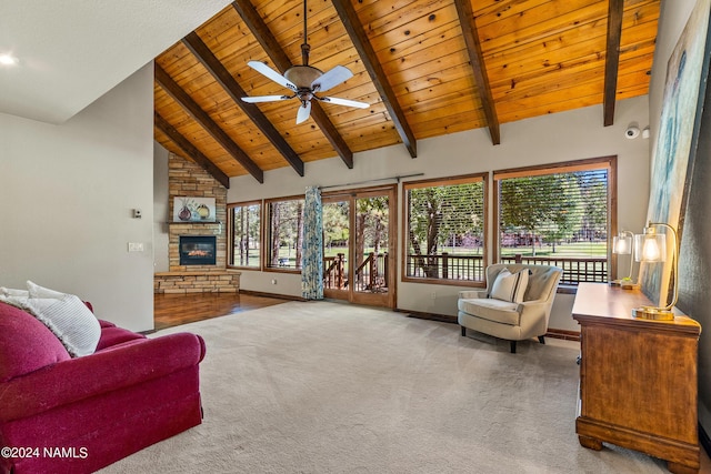 living room featuring beam ceiling, high vaulted ceiling, carpet, and wood ceiling