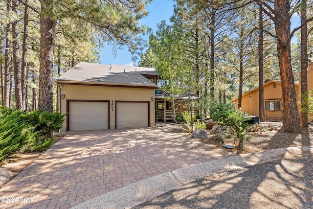 view of front of property featuring a garage