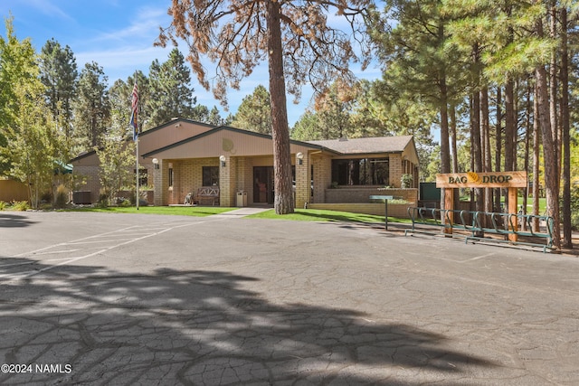 single story home with central air condition unit