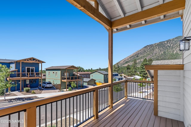 5026 E Retreat Cir, Flagstaff, AZ 86004 - wooden deck with a mountain view and a residential view