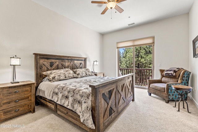 4759 W Quick Draw, Flagstaff, AZ 86005 - bedroom featuring light carpet, access to outside, and a ceiling fan