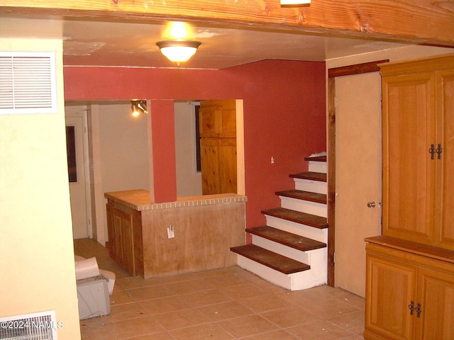1600 S River Valley Rd, Flagstaff, AZ 86004 - stairs featuring tile patterned flooring and visible vents