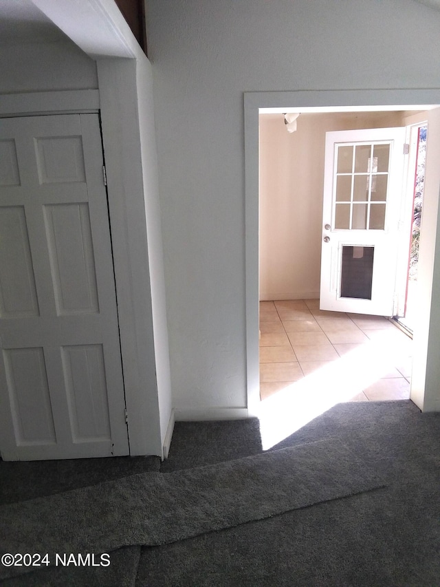 1600 S River Valley Rd, Flagstaff, AZ 86004 - hall with tile patterned flooring and carpet flooring