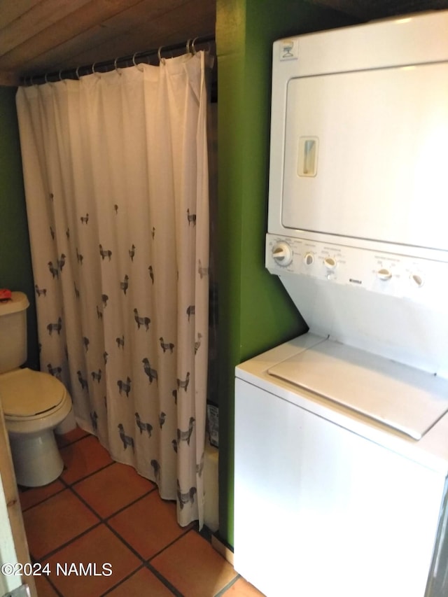 1600 S River Valley Rd, Flagstaff, AZ 86004 - washroom featuring laundry area, stacked washer and dryer, and light tile patterned floors