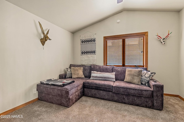 living room with lofted ceiling and carpet