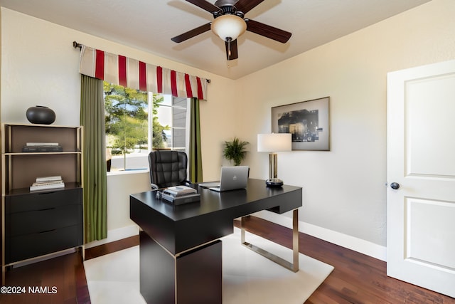 office with ceiling fan and dark hardwood / wood-style flooring