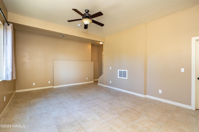 empty room featuring ceiling fan