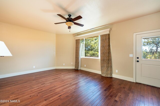 entryway featuring ceiling fan and dark hardwood / wood-style floors