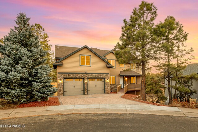 craftsman house featuring a garage