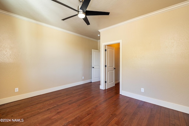 spare room with ceiling fan, ornamental molding, and dark hardwood / wood-style flooring