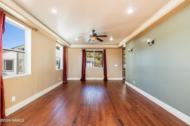 unfurnished room with ceiling fan, crown molding, and dark hardwood / wood-style floors