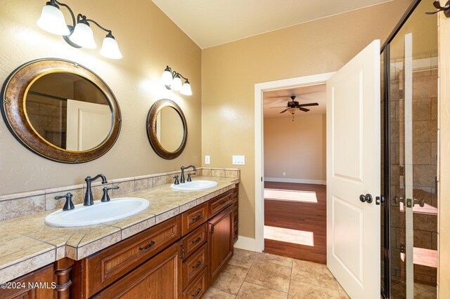 bathroom featuring tile patterned floors and vanity