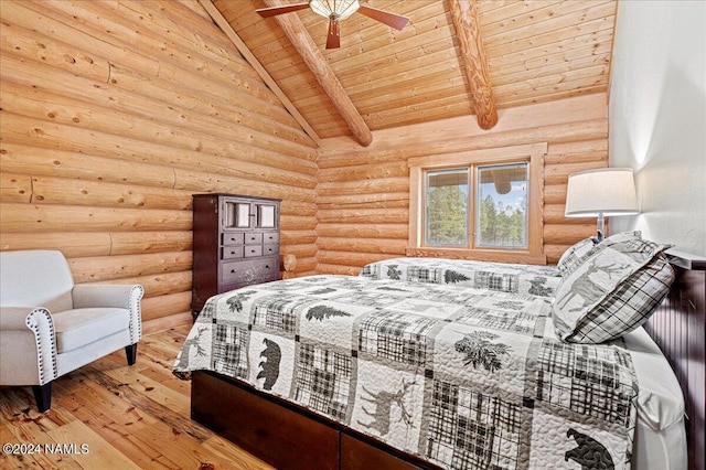 bedroom with ceiling fan, hardwood / wood-style flooring, lofted ceiling with beams, and wood ceiling