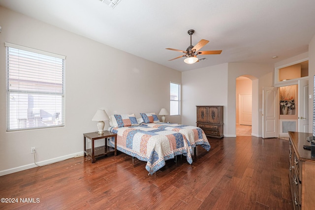 bedroom featuring ceiling fan and dark hardwood / wood-style flooring