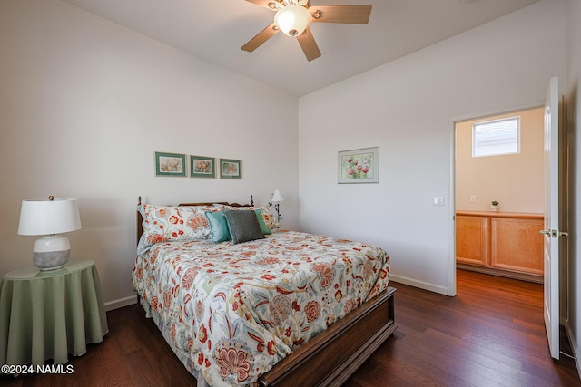 bedroom featuring dark wood-type flooring and ceiling fan