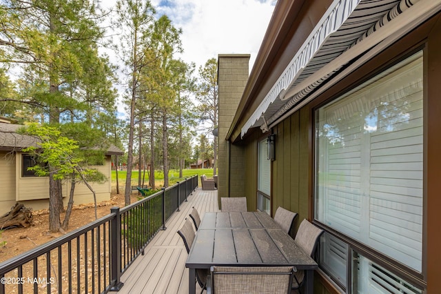 6205 N Country Club Dr, Flagstaff, AZ 86004 - wooden terrace featuring outdoor dining area