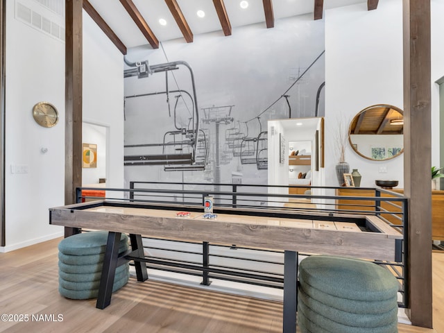 6205 N Country Club Dr, Flagstaff, AZ 86004 - rec room featuring beam ceiling, wood finished floors, recessed lighting, and a high ceiling