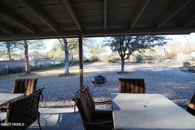 view of patio / terrace with an outdoor fire pit