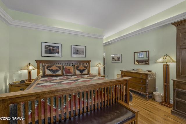 bedroom featuring wood finished floors