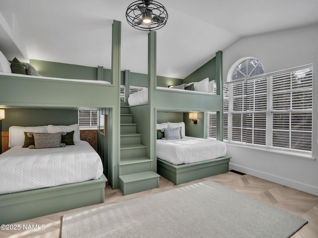 6136 E Abineau Canyon Dr, Flagstaff, AZ 86004 - bedroom featuring vaulted ceiling and baseboards