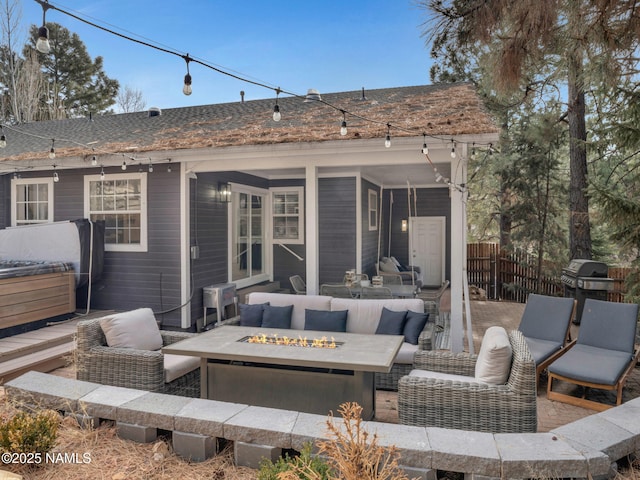 6136 E Abineau Canyon Dr, Flagstaff, AZ 86004 - view of patio featuring an outdoor living space with a fire pit and a grill