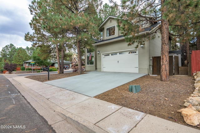 exterior space with a garage