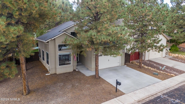 view of front of property with a garage