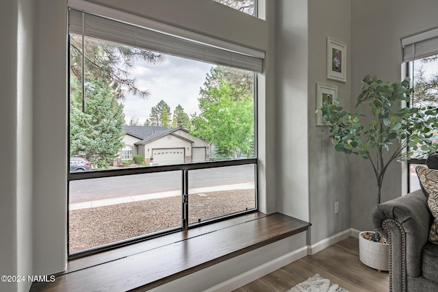 entryway with hardwood / wood-style flooring