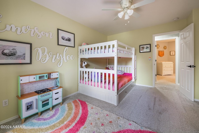 bedroom featuring ceiling fan and carpet flooring